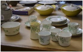 Green and White Floral Teaset (20) pieces in total. ( one cup damaged).