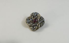 Late Victorian High Carat Gold Enamelled Brooch/Pendant Central round ruby set in a scroll and