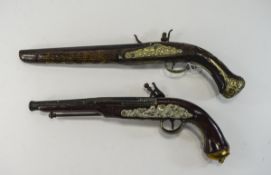 2 Replica Flintlock Style Pistols, one marked Hawkins both finished with metal decoration.