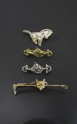 Collection of Four Equestrian Brooches, some marked for silver,