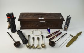Carved Oak Box with Miscellaneous Items Carved Oak box contains small Telescope, pens, paper knife,