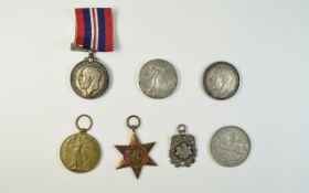 A Collection of World War I Medals and Coins.