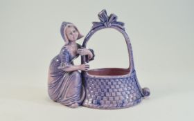 Exquisite Schafer and Vater pink bisque 'lady with Basket'. One of the rarer earlier pieces.
