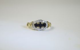 18ct Gold Diamond and Sapphire Cluster R