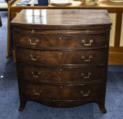 George III Mahogany Bow Fronted Chest Of Drawers Standing On Four Splayed Legs With Original Brass