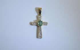 Gold Diamond/Emerald Cross Pendant Central pale oval shaped emerald,