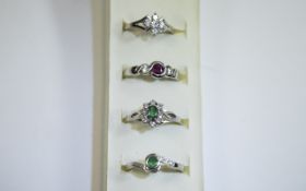 4 x Silver Emerald/Ruby Rings Collection of rings in varying designs with central small stones in
