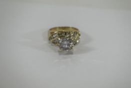 14ct Diamond Solitaire Ring unusual raised setting with wave pattern to band beneath