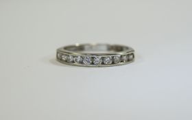 18ct Ladies Channel Set Diamond Ring Set with eleven bright diamonds, fully hallmarked,