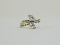 9ct Cluster Ring Featuring two teardrop shaped stones in curved snake like formation