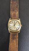 Antique Gold wrist watch Very worn brown leather strap, Square gold casement,