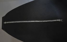 White Topaz Tennis Bracelet, a single row of round cut, sparkling white topaz, totalling 11cts,