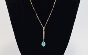 Antique 9 Carat Gold Turquoise Set Pendant Drop attached to a 9 carat gold long chain.