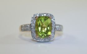14ct Gold Set Peridot and Diamond Cluster Ring.