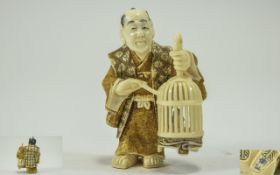 Japanese Very Finely Carved and Signed 19th Century Ivory Netsuke of a Japanese Man Holding a Large