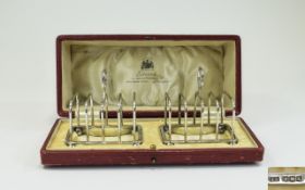 George V Nice Quality Pair of Four Tier Toast Racks with original box. Hallmark Sheffiled 1919.