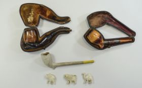 Two Various Meerschaum Pipes, 1 clay pipe with Irish harp motif, and 3 miniature carved animals,