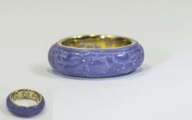 14 Carat Gold and Jade Band Ring marked 858 -14 ct ring size O-P. Jade - Purple.