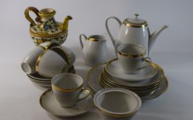 Modern White Coffee Set with gilt trim. Comprises Coffee pot, 6 teacups and saucers, side plates and
