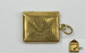 Stamp box Small Gold tone stamp box in envelope shape with hinged closure,