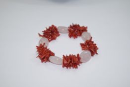Antique Coral/Rose Quartz Bracelet Elasticated bracelet with 5 lozenge shaped Rose Quartz stones