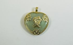 9 Ct Gold Heart Shaped Jade Set Pendant with Chinese script to centre. Jade of good colour.