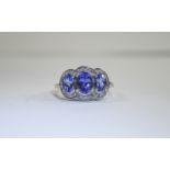 Tanzanite and Diamond Trilogy Ring, thre