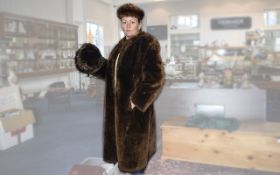 Long Brown Fur Coat and Two Fur Hats Lad