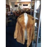 Ladies Fox Fur Coat Mid length fur coat with rever collar,