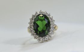 9ct Gold Cluster Ring set with green and clear faceted stones. Fully hallmarked.