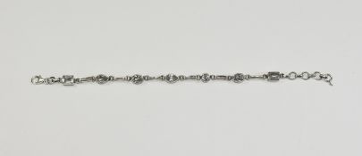 Silver Gemset Bracelet set with clear faceted topaz stones.