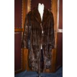 Full Length Ermine Ladies Coat Dark brown long coat with rever collar and side seam pockets,