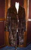 Full Length Ermine Ladies Coat Dark brown long coat with rever collar and side seam pockets,