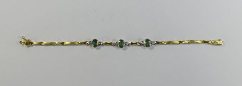 Ladies 18ct Gold Diamond And Emerald Bracelet, Three Rubover Set Oval Emeralds Each Between Two