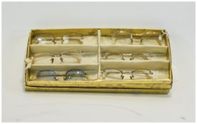 Box Containing A Collection Of Mid 20thC Spectacles,