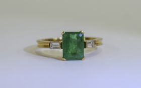 18ct Gold Set Single Stone Emerald Ring with Diamond Shoulders.