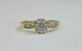 18ct Yellow Gold Single Stone Diamond Illusion Set Ring with Diamond Shoulders.