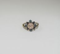 9 Carat Gold Diamond Cluster Ring Flowerhead setting mounted with black and white round brilliant