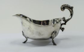 A Stylish Silver Sauce Boat From The 1930's Period, Supported on Shell and Hoofed Feet.