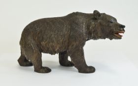 A Black Forest Carved Bear. 8.1/4 Inches Long, Glass Eyes.