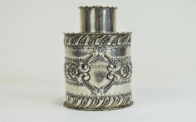 A Round Silver Tea Caddy / Canister. 2.1/4 Diameter x 3 Inches High, with Embossing.