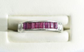 14ct White Gold Channel Set Ruby Ring. The Eight Rubies of Good Colour. Marked 14ct.