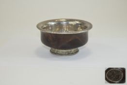 Tibetan - 19th Century Silver Mounted Burled Mazer Bowl with Silver Lining, Rim and Decorative Foot.