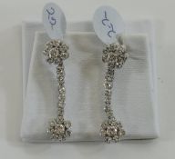Impressive Pair of Platinum French Set Pair of Diamond Drop Cluster Earrings.