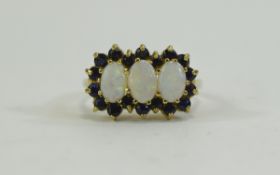 Ladies 9ct Gold Set Opal and Sapphire Dress Ring. The 3 Central Opals Surrounded by Sapphires.