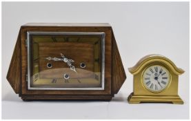1930's Mantle Clock Art Deco Form. Roman numerals, silver bezel and hands.