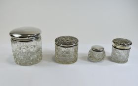 A Collection of Edwardian Silver Lidded / Cut Glass Ladies Dressing Table Jars ( 4 ) In Total.