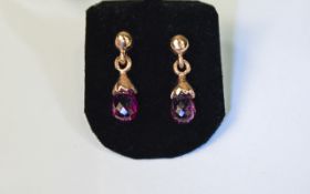 Pink Tourmaline Briolette Drop Earrings, each earring comprising a single briolette cut pink