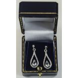9ct Gold Diamond & Aquamarine Earrings. Central pear shped aquamarine and 3 small diamonds.