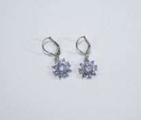Tanzanite Pair of Cluster Drop Earrings, a flower or star shaped cluster of tanzanites totalling 1.